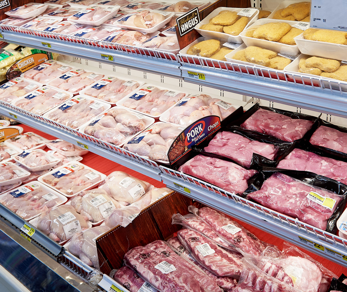 fresh meat on cooler shelf