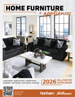 Dark coloured Sectional in a living room surrounded by large windows